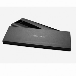 Caja cartón para corbata firma DEVOTA & LOMBA,color negro, pedido mínimo 100 uds.Fabricación española en 30 días.